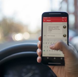 Person Driving With Phone