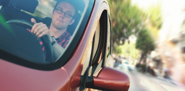 Man Driving Distracted