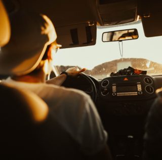 Teenager driving car on freeway