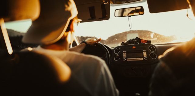 Teenager driving car on freeway