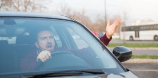 Driver in car with road rage